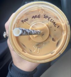 someone is holding up a plastic cup with something in it that says, you are special