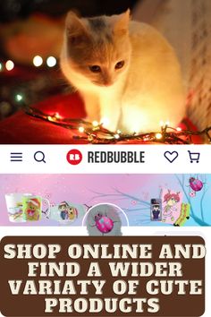 a white cat sitting on top of a table next to a redbubble ad