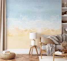 a living room scene with focus on the ocean wallpaper and wood flooring that has been painted