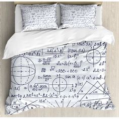 an image of a bed with math sheets on it