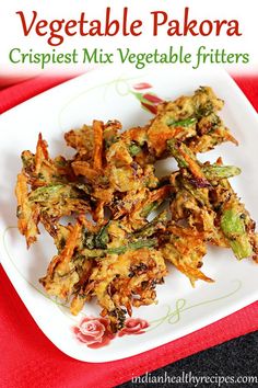 vegetable pakora crispies mix vegetable fritters on a white plate with red napkin