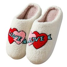 Introducing the BERANMEY Cute Valentine's Day Slippers for Women  a harmonious blend of comfort, style, and pure joy. Indulge your feet in the luxurious softness of these plush slip-ons, meticulously designed to infuse warmth and happiness into your moments of indoor relaxation.Unveil the charm of our Heart & Rose slippers, thoughtfully crafted for both women and men with a versatile unisex design catering to a broad range of sizes. Immerse your feet in the finest materials, as these slippers fe Comfy Cozy Home, Elegant Embroidery, Rainbow Fashion, Home Slippers, Rose Style, Shoe Covers, House Shoes, Valentine Day Love, Comfy Cozy