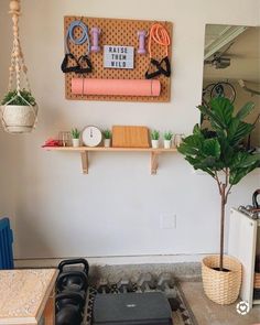 a living room filled with lots of furniture and decor on top of a wooden shelf