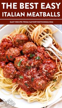 a white plate topped with spaghetti and meatballs