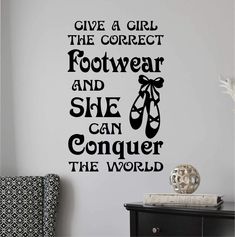 a wall decal that says give a girl the correct footwear and she can conquer the world