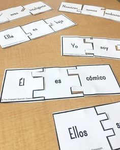 several pieces of paper cut out to spell the words in spanish