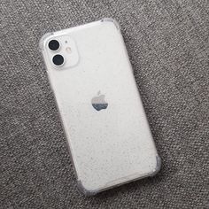 an iphone case sitting on top of a carpet