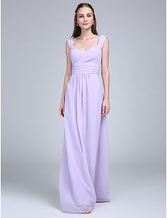 a woman in a long purple dress