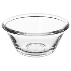 a clear glass bowl on a white background