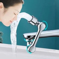 a woman is washing her face with a faucet and water running from it