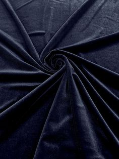 an up close shot of a dark blue fabric