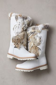 You'll revel in winter weather when you get to wear the Sira boots, handcrafted from leather and soft rabbit fur in Northern Italy. Built to keep you cozy warm in temps as low as -4°F with their 100% wool footbeds and insulating lining, these snow-proof and water-resistant boots feature decorative leather lacing and an abundance of plush fur trim. Robust synthetic nonskid outsoles provide traction on ice and snow. Luxury Wool Boots For Winter, Bulky Winter Boots, Winter Boots For Ladies, Winter Heels Shoes 2022, Luxury Women's Winter Wedge Boots, Stylish Winter Boots 2022, Cute Winter Boots With Heel, Stylish Winter Boots Casual 2022, Luxury Modern Boots For Fall