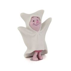 a small figurine with a white cloak on it's head