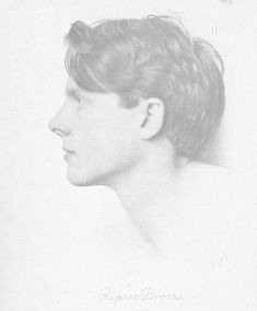 an old black and white photo of a man's profile with hair pulled back