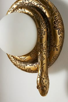 Bold and daring, this serpent sconce proves that every piece of décor can offer something special. This item is UL listed, meaning it has been tested and approved to meet the government-regulated safety standards for the USA. Use with electrical outlets 110-120v or lower, as anything higher can cause fire or injury. If you're purchasing this item for use outside of the United States, employ the adapter and voltage converter suited for your country. | Serpent Sconce by Anthropologie in Gold Dream House Decor, House Inspo, My Dream Home, Wall Light, Apartment Decor, The Wall, Decor Inspiration, Home Interior Design, Sweet Home