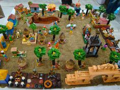 an assortment of toys are displayed on a table