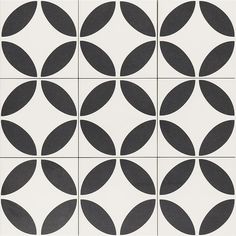 a black and white tile with circles on it