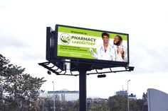 a billboard with an image of two men in lab coats on it's side