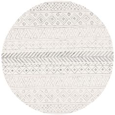 a round rug with an abstract design in grey and white