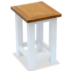 Our two-tone wooden end table will add a touch of elegance to your home decor with its timeless design. The table has a solid oak top, which adds to its sturdiness and durability. The oak has beautiful wood grains that give the furniture a touch of natural charm. The frame is made of solid pinewood with a white finish, which adds to the accent table's contemporary style. Thanks to its compact design, this end table doesn't take up much space but is very practical. Its sturdy top is ideal for keeping food and drinks, or decorative items like vases, photo frames or potted plants. Note: The item is already assembled; no assembly is required. Color: White and brown Material: Solid oak wood, solid pinewood, MDF Dimensions: 10.6" x 9.4" x 14.6" (L x W x H) No assembly required Wooden End Table, Small End Tables, Wooden Nightstand, Modern End Tables, Wooden Side Table, Sofa End Tables, Table Cafe, Wood Sofa, Wood End Tables