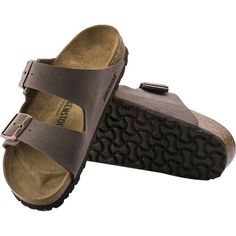 After a long morning hike, nothing feels better than to get back to camp, take off your heavy hiking boots, and slip on the Birkenstock Men's Arizona Sandal. Better than going barefoot, this sandal's contoured cork footbed conforms to the shape of your foot while protecting your foot from rocks and thorns as you walk from your tent to the lake for a late lunch overlooking the water. The durable synthetic straps are finished with a leather-like texture for classic style, while the buckled design Comfortable Brown Sandals For Outdoor Activities, Casual Leather Slides For Outdoor Activities, Casual Brown Slides For Outdoor, Casual Brown Outdoor Slides, Brown Hiking Sandals With Removable Insole, Brown Round Toe Hiking Sandals, Outdoor Sandals With Leather Footbed And Round Toe, Outdoor Slip-on Sandals With Leather Footbed, Leather Slip-on Slides For Outdoor