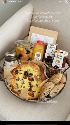 a basket filled with food sitting on top of a chair