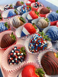 chocolate covered strawberries and strawberries with sprinkles are in the box