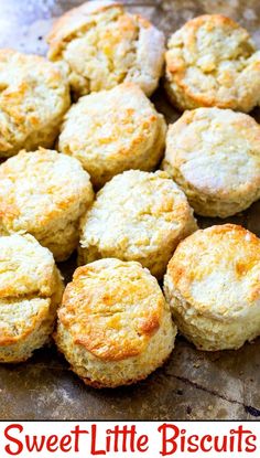 sweet little biscuits on a baking sheet with the words sweet little biscuits in red lettering