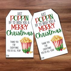 two christmas gift tags with popcorn on them