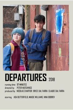 two people standing next to each other in front of a brick wall with the words departures on it