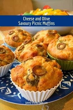 cheese and olive savory picnic muffins on a blue plate