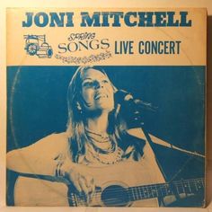 an old book with the cover of jon mitchell's song live concert