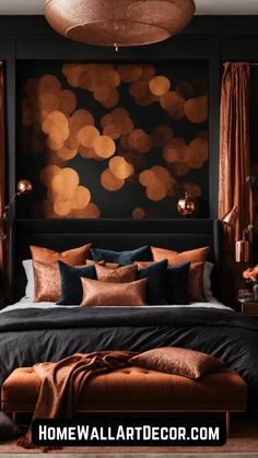 a bedroom with black walls and brown bedding