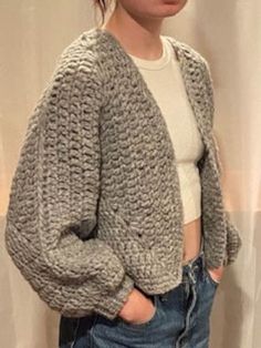 Handmade crochet sweater.  Alpaca and acrylic yarn.   Machine wash cold and air dry. Gray Knitted Acrylic Outerwear, Cozy Gray Acrylic Outerwear, Spring Knitted Acrylic Sweater, Cozy Acrylic Yarn Sweater For Spring, Knitted Acrylic Cardigan For Cold Weather, Winter Knitted Acrylic Sweater, Spring Cozy Sweater In Acrylic Yarn, Cozy Gray Acrylic Sweater, Gray Knitted Acrylic Sweater