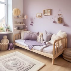 a child's bedroom with purple walls and white rugs on the wooden floor