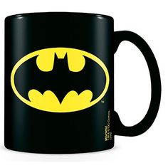 the batman logo on a black mug is shown in this graphic file, and it appears to be yellow