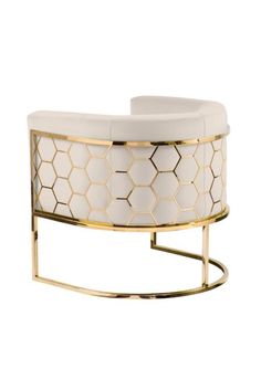 a white and gold coffee table on a stand