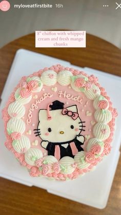 a hello kitty birthday cake with pink frosting