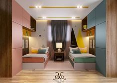 two beds in a room with wooden flooring and colorful wallpaper on the walls