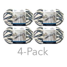 four round plates with blue and white designs on the front, 4 - pack in each