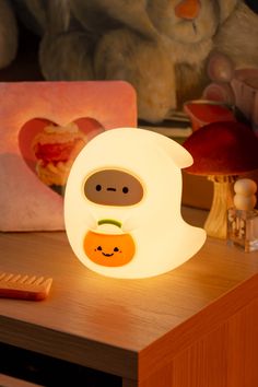 a lamp that looks like a slotty the slotty is sitting on a table