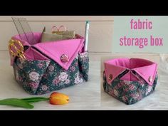 the fabric storage box has scissors and other items in it, along with a tulip