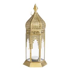 a golden metal lantern with a candle inside