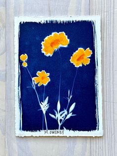 an image of yellow flowers on a blue background