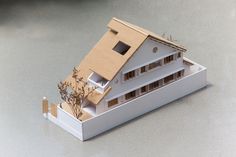 a model house sitting on top of a table