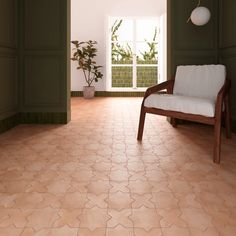 an empty room with a chair and potted plants