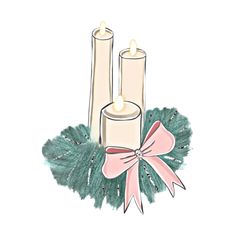 two candles are sitting next to each other on top of a green wreath with pink ribbon