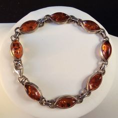 Listing Ia For An Amber Bracelet On Silver. It Is Not Hallmarked. Not A Brand New Item. Amber Is Intact, And The Bracelet Is Sturdy And Strong. Please See Photos For Measurement, And Condition. In Overall Good Condition. Metaphysical Properties Of Amber: Amber Is A Powerful Healer And Cleanser Of The Body, Mind And Spirit. It Also Cleanses The Environment. Amber Draws Disease From The Body, Healing And Renewing The Nervous System And Balancing The Right And Left Parts Of The Brain. It Absorbs Pa Orange Jewelry Aesthetic, Shifting Closet, Parts Of The Brain, Jewelry Tattoo, The Nervous System, Sophomore Year, Body Healing, Amber Bracelet, Amber Necklace