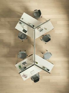 overhead view of an office cubicle with desks, chairs and mirrors on the floor