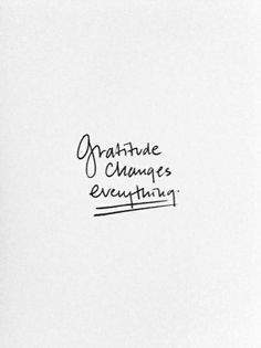 handwriting on paper with the words gratitude changes everything